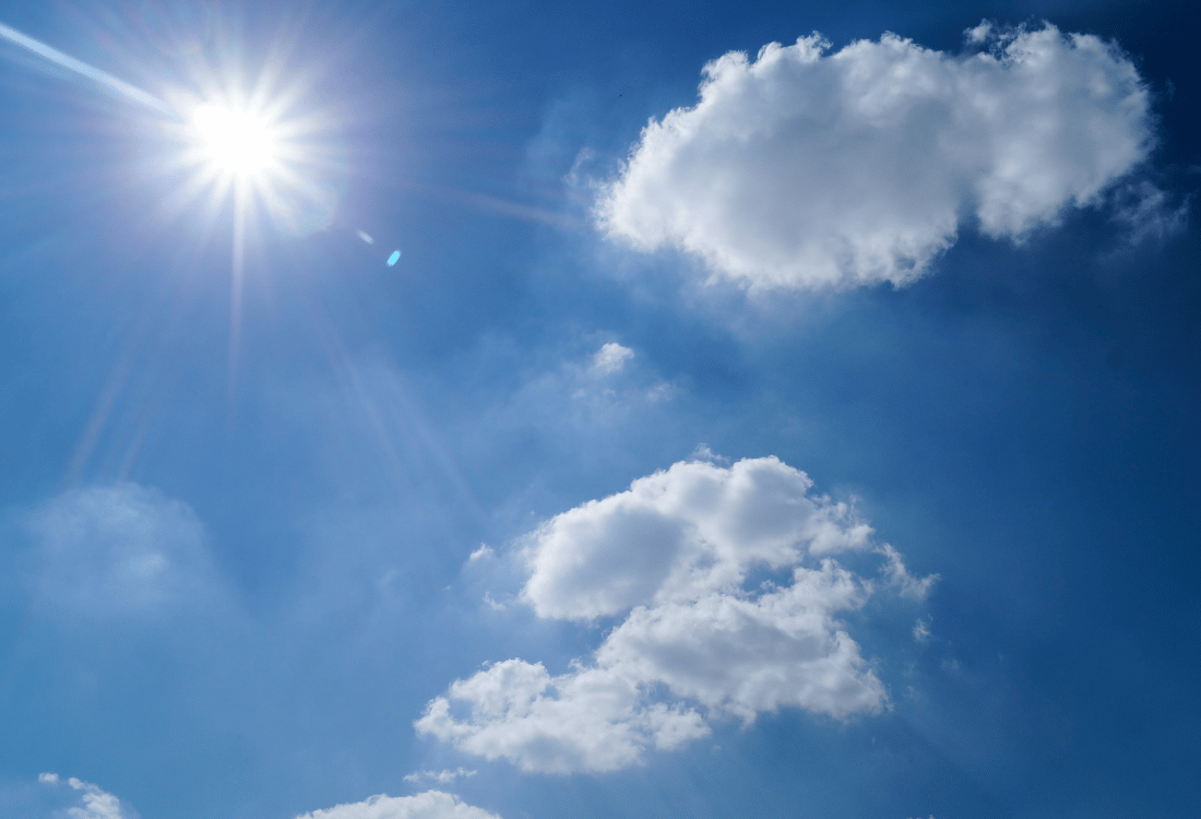 The sun in the sky giving people vitamin D